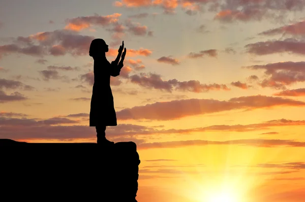 Silhouette einer betenden Frau — Stockfoto