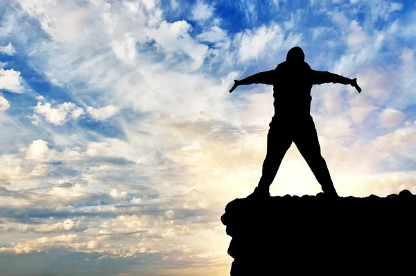 Silhouette of a happy man — Stock Photo, Image