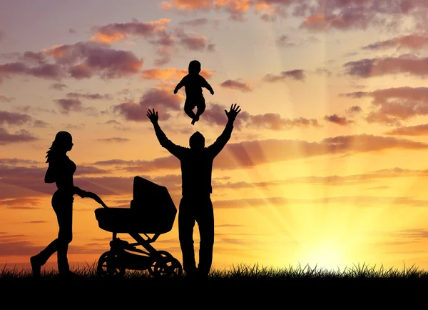 Silhouet van een gelukkige familie — Stockfoto