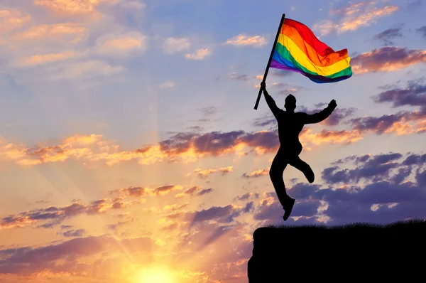 Silhouette of a happy gay — Stock Photo, Image