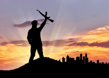 Silahlı bir terörist silüeti 
