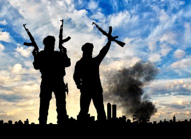 Silhouette of the terrorists and the city clipart