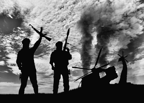 Silhouette of terrorists and blow up the helicopter