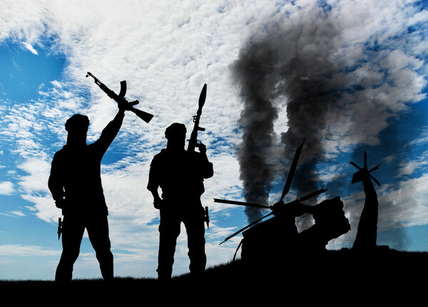 Silhouette of terrorists and blow up the helicopter