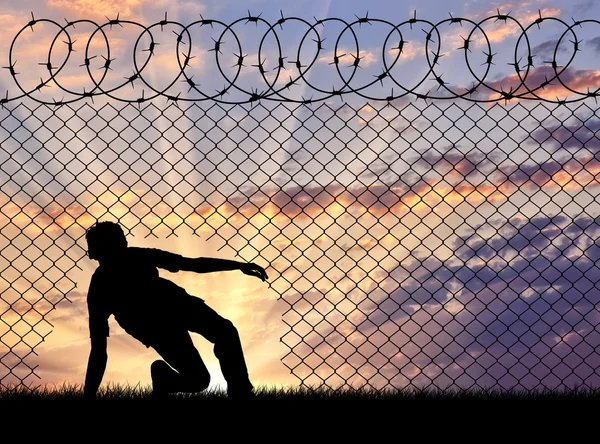 Silhouet van vluchtelingen grens de — Stockfoto