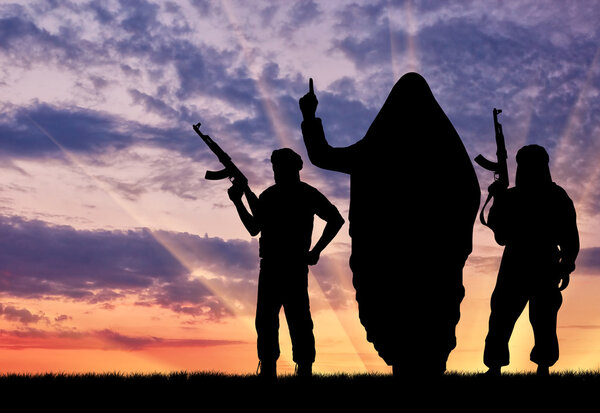 Silhouette of three terrorists 