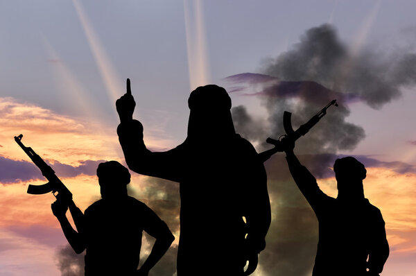 Silhouette of three terrorists 