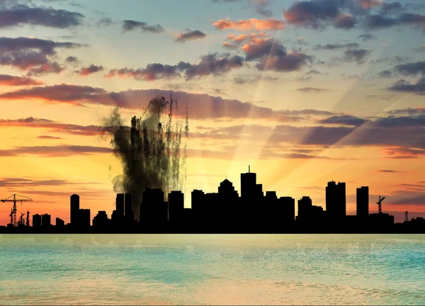 Silhouette of the city in a smoke — Stock Photo, Image