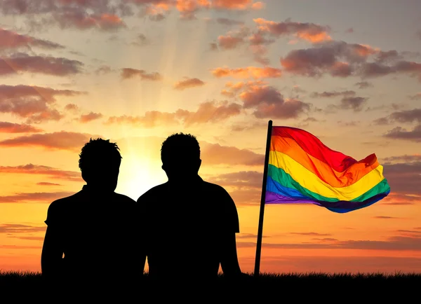 Silhouette of two gay vacationers at sunset — Stock Photo, Image