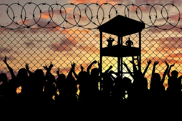 Silhouette of a crowd of refugees — Stock Photo, Image