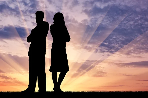Silhouette of man and woman in a quarrel — Stock Photo, Image