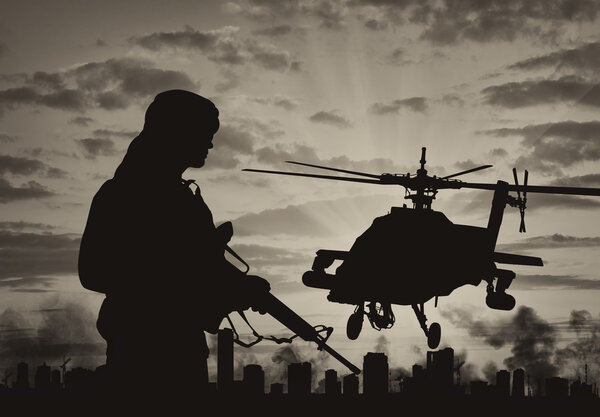 Силуэт террориста и вертолета
 