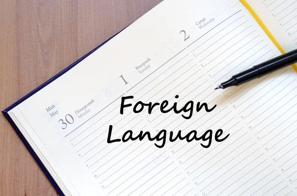 Idioma extranjero escribir en cuaderno —  Fotos de Stock
