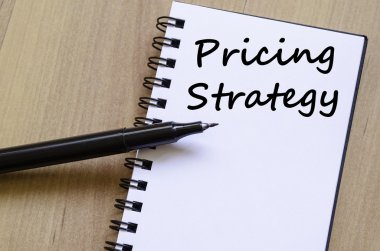 Pricing strategy write on notebook clipart