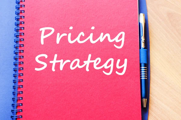 Pricing strategy write on notebook — Stock Photo, Image