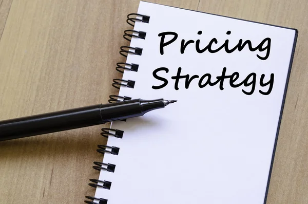 Pricing strategy write on notebook — Stock Photo, Image