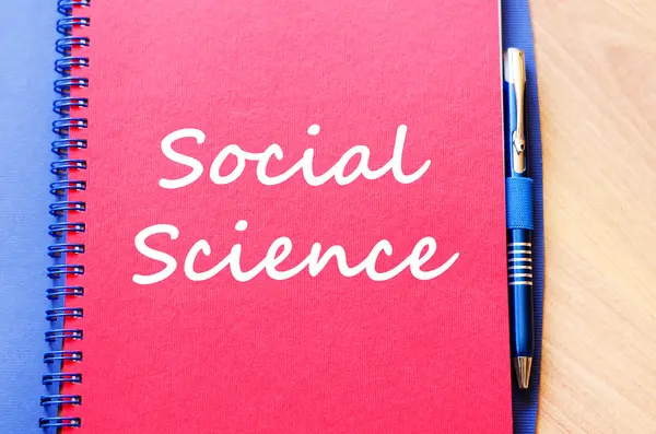 Társadalomtudományi írni a notebook — Stock Fotó