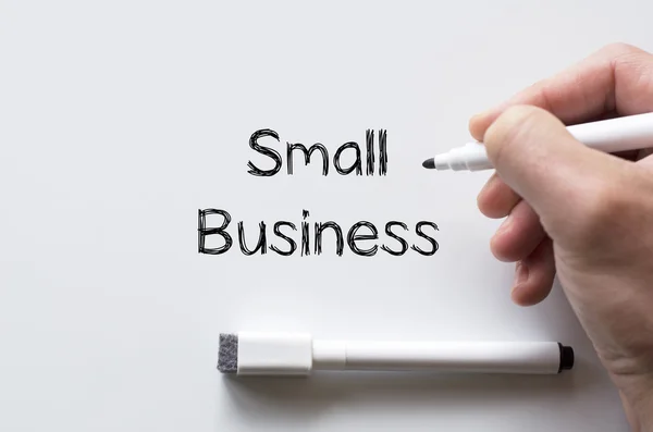 Pequenas empresas escritas em quadro branco — Fotografia de Stock