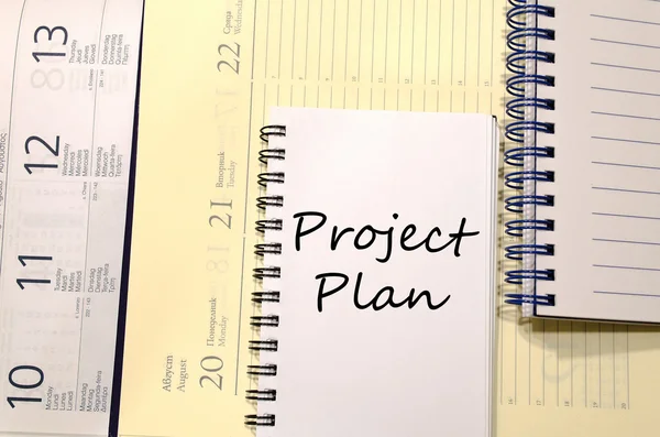 Plan de proyecto escribir en el cuaderno — Foto de Stock