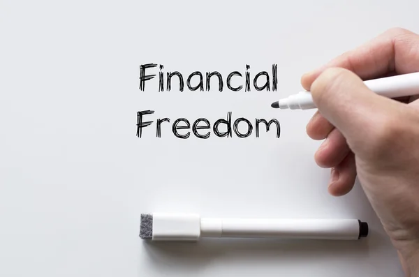 Financial freedom written on whiteboard — Stock Photo, Image