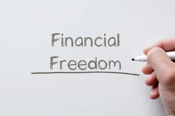 Financial freedom written on whiteboard — Stock Photo, Image