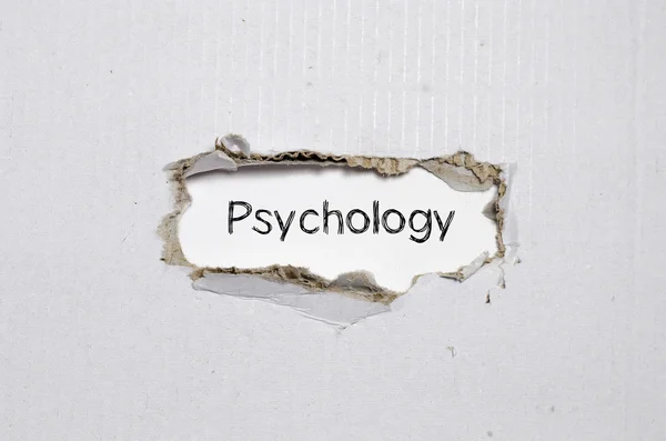 La palabra psicología que aparece detrás del papel roto . — Foto de Stock
