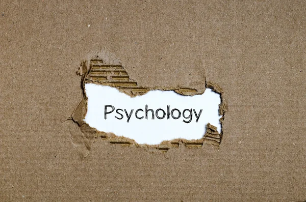 La palabra psicología que aparece detrás del papel roto . — Foto de Stock