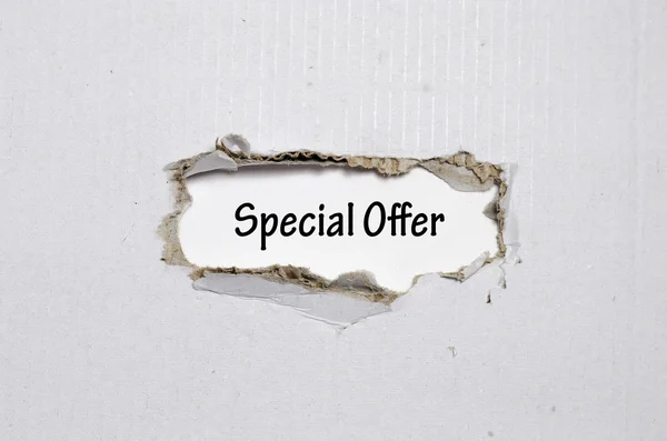 The word special offer appearing behind torn paper — Stock Photo, Image