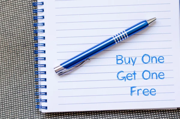 Buy one get one free write on notebook — Stock Photo, Image