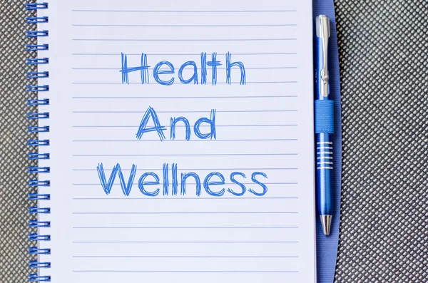 Health and wellness write on notebook — Stock Photo, Image