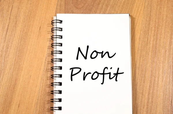 Non profit write on notebook — Stock Photo, Image