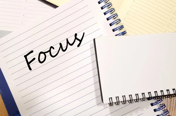 Focus write on notebook — Stock Photo, Image