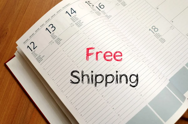 Free shipping text concept on notebook — Stock Photo, Image