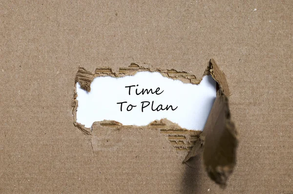 The words time to plan appearing behind torn paper — Stock Photo, Image