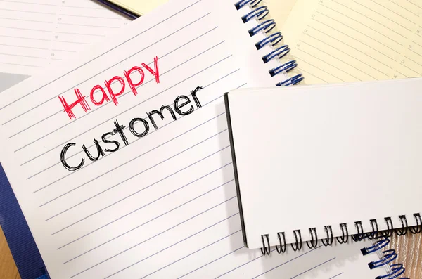 Happy customer text concept on notebook — Stock Photo, Image