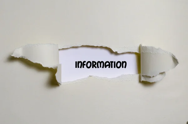 The word information appearing behind torn paper — Stock Photo, Image