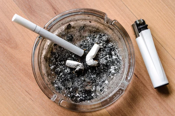 Ashtray and lighter — Stock Photo, Image