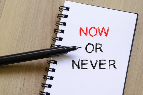 Now or never write on notebook — Stock Photo, Image