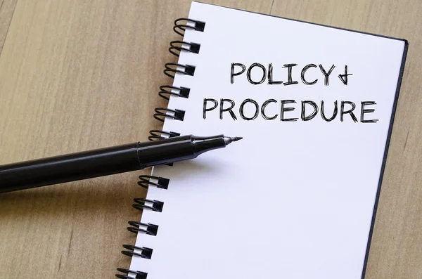 Policy och procedur skriva på anteckningsboken — Stockfoto