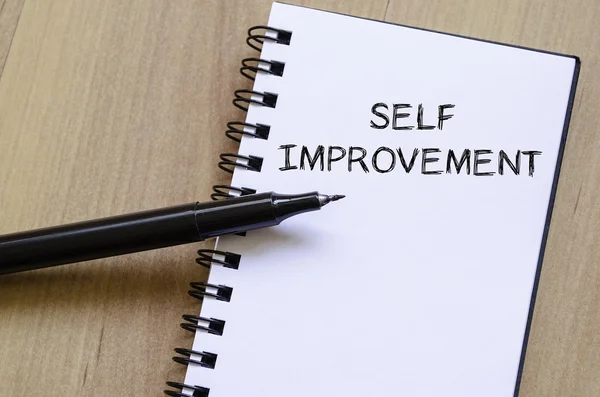 Self improvement write on notebook — Stock Photo, Image
