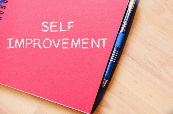 Self improvement write on notebook — Stock Photo, Image