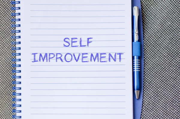 Self improvement write on notebook — Stock Photo, Image