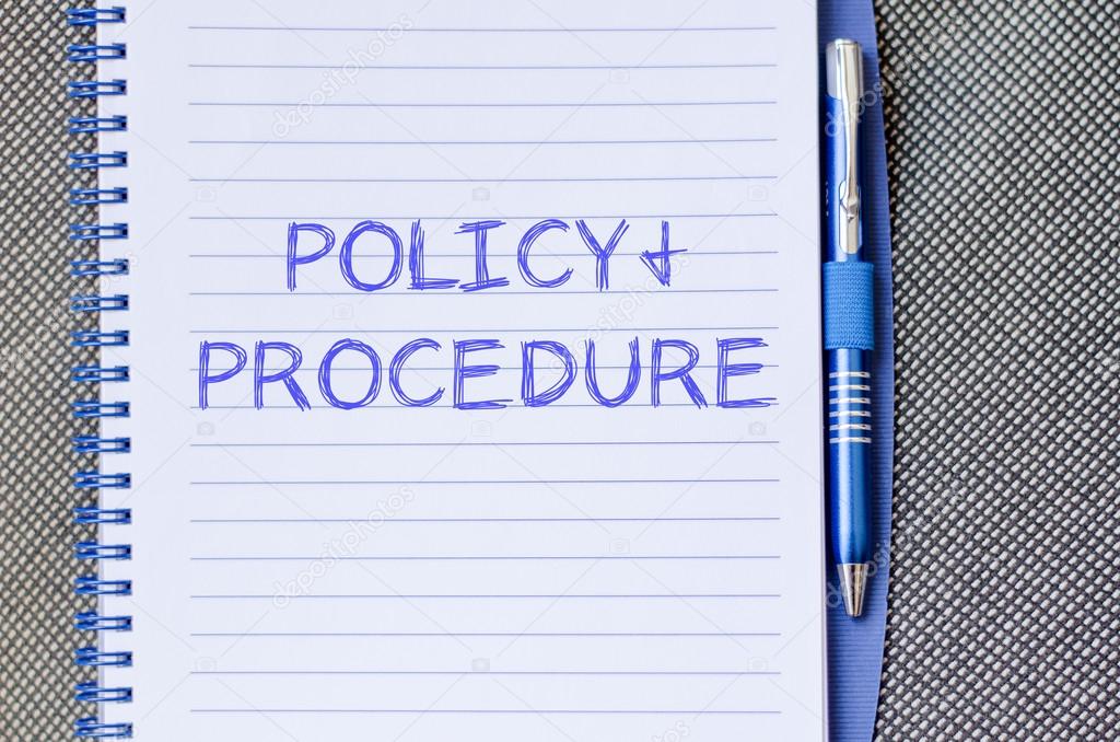 Policy and procedure write on notebook