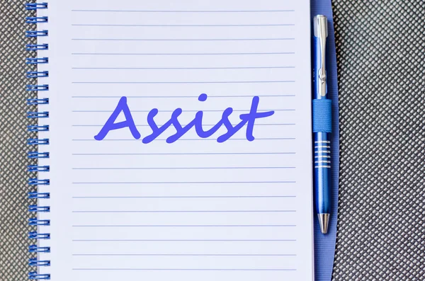 Assist write on notebook — Stock Photo, Image