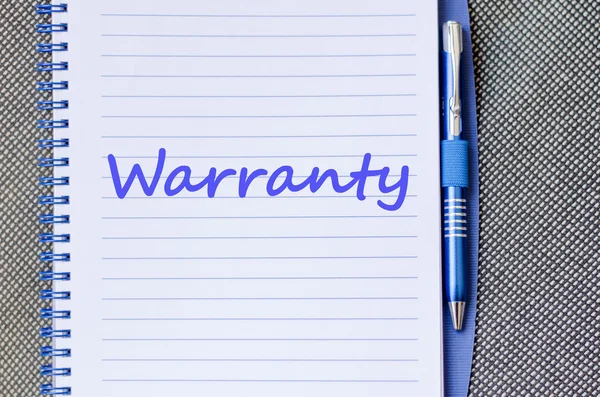 Warranty write on notebook — Stock Photo, Image