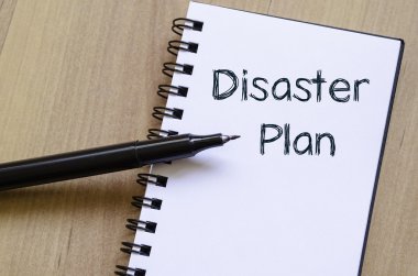Afet planı yazın defter üzerinde