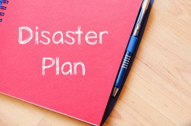 Disaster plan write on notebook clipart