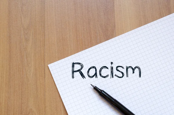 Racism write on notebook — Stock Photo, Image