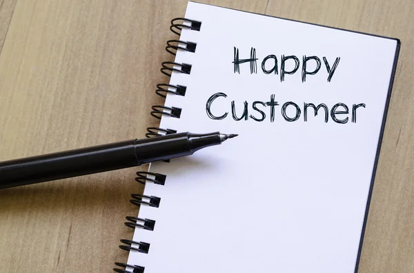 Happy customer write on notebook — Stock Photo, Image