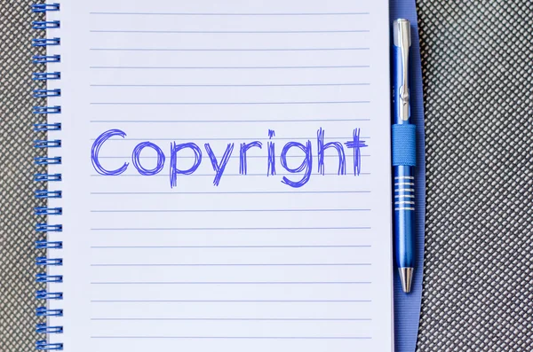 Prawa autorskie zapisu na notebooka — Zdjęcie stockowe